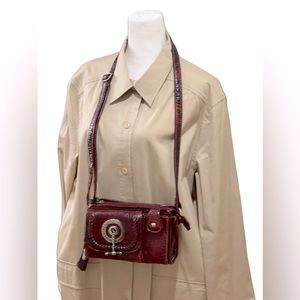 M.C. Genuine leather red Size large Dimensions 10x10 21"